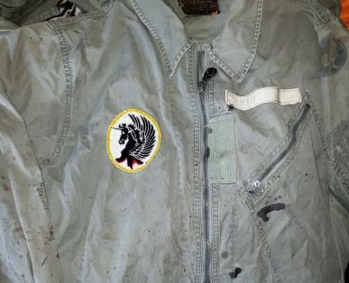 This patch design of the 2nd Fighter Interceptor Squadron is always attributed to its later years as a training squadron in the mid-1970s. Fine, but what is it doing on a flightsuit from the early 1950s? This is the first pattern of K-2B flightsuit: big collar, only one chest pocket. The nametape is certainly of the era, not the 70s. It and the patch were sewn on by the same man at the same time - a long time ago (the thread and stitching show that). Anything is possible, and one should be conservative in their judgement on such matters, but one also has a hard time believing that when the squadron reactivated in 1974 one of its pilots dusted off a 20 year old flightsuit and said "make sure you sew on my outdated nametape at the same time".
