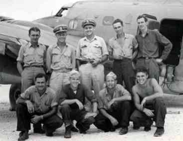 Veterans of many a mission, this VPB-146 crew poses by a PV sporting a "kill" marking for having sunk a Japanese ship.